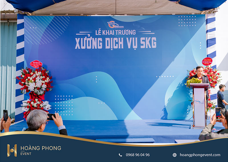 thiết kế background khai trương theo yêu cầu